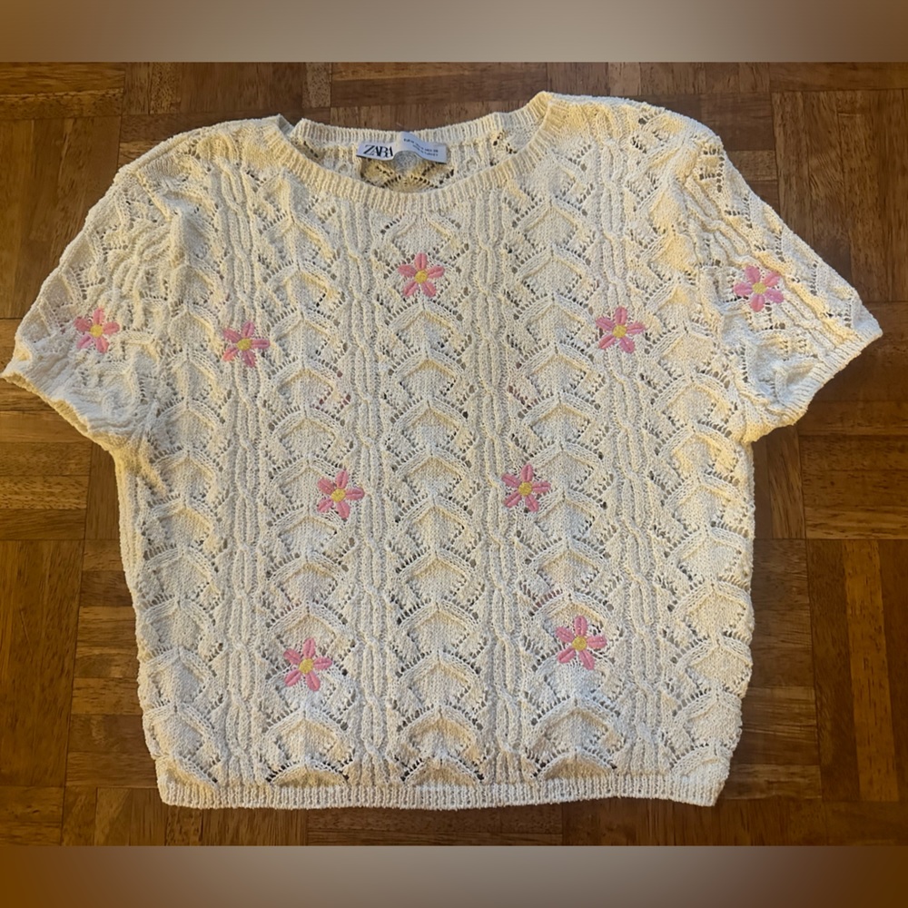 Cream knit top with pink flowers.  Zara size M